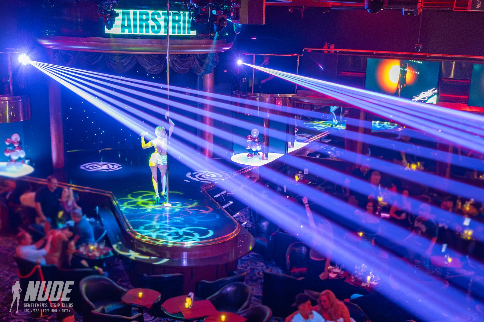 Airstrip Las Vegas stage with lasers and a full crowd