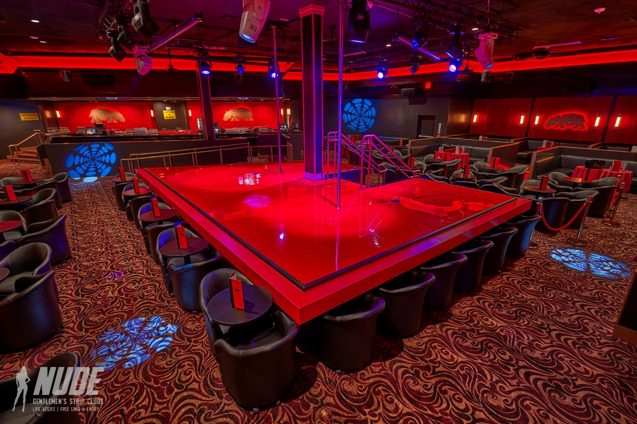 Peppermint Hippo Las Vegas red-lit stage with seating around it