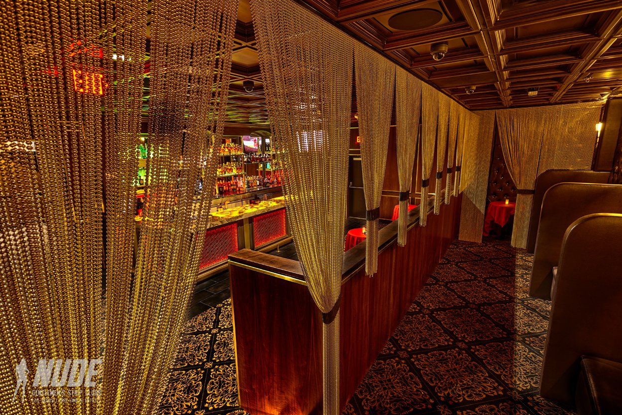 Peppermint Hippo Las Vegas VIP booths with gold chain curtains