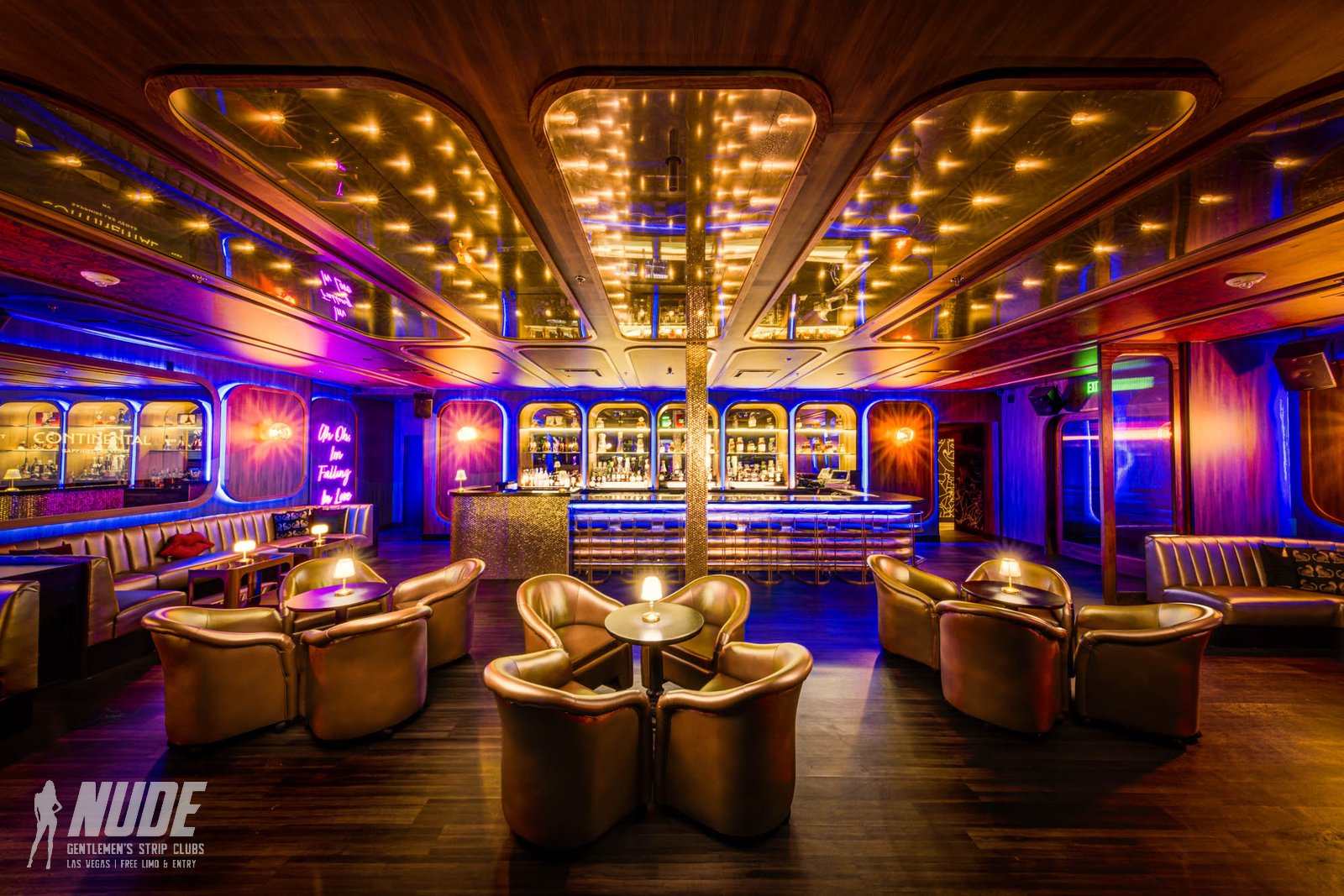 Sapphire Las Vegas gold lounge chairs near the bar