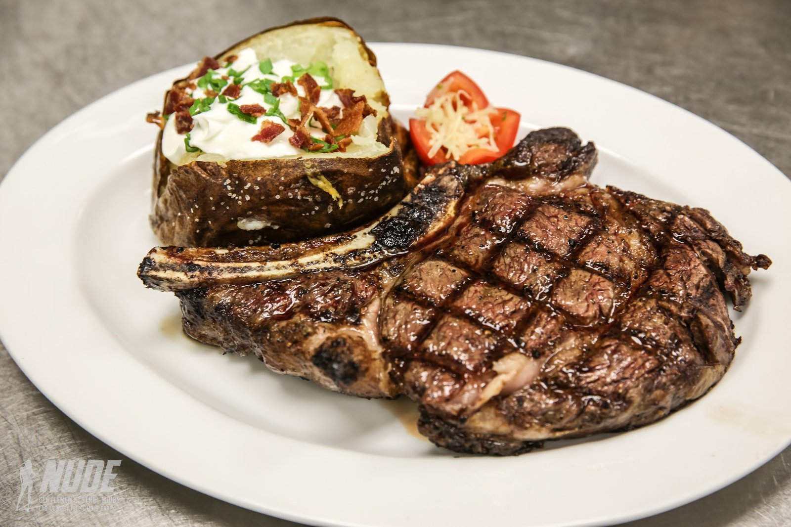Treasures Las Vegas steak with baked potato