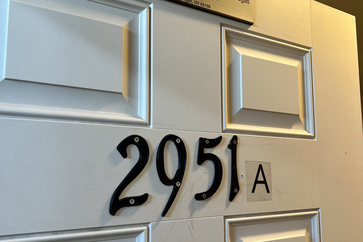 NUDE Vegas office door